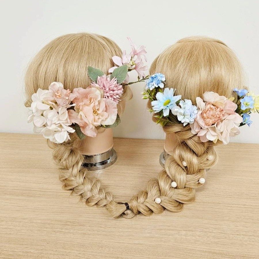 高校生が作ったヘアアレンジ作品(編み込みと花飾り)